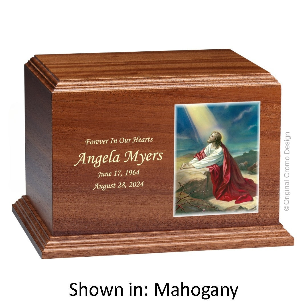 Catholic cremation urn with Jesus Praying Wood finish by Cromo NB